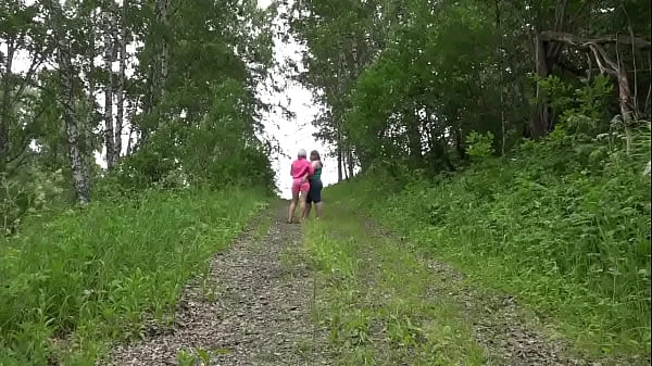 Big Posh Butts outdoors in a public park. Mature lesbians walk in nature and undress. Amateur fetish. PAWG. MILFs.